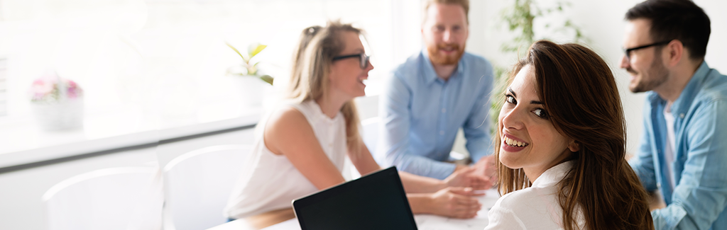 Group of Individuals working at Table