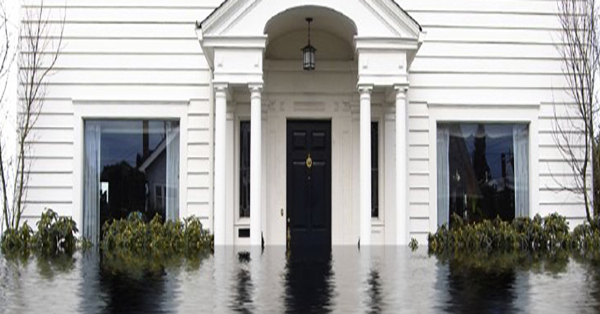 Front of a a house that is submerged in water