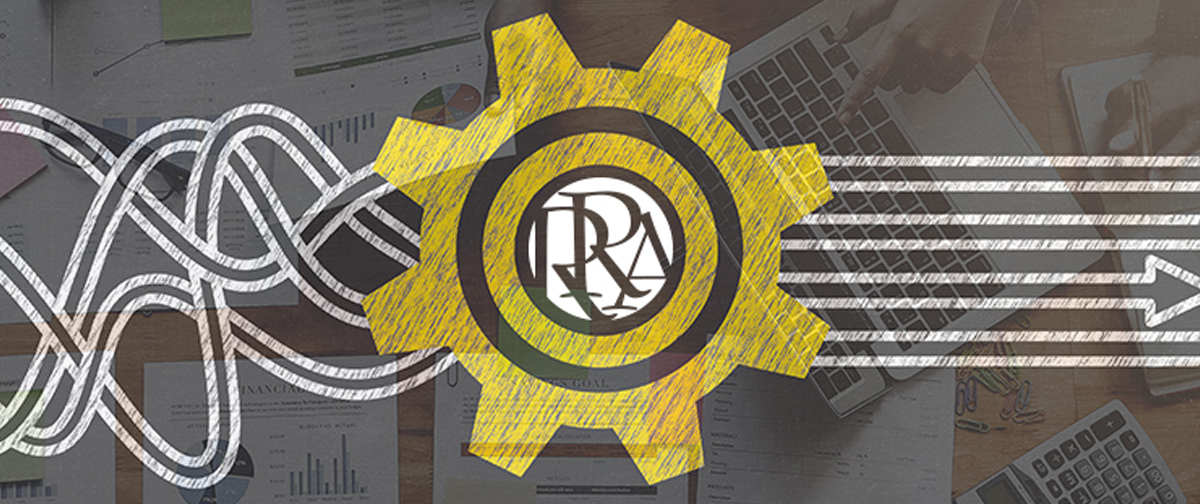 RRA Logo within a gear. People working in background.