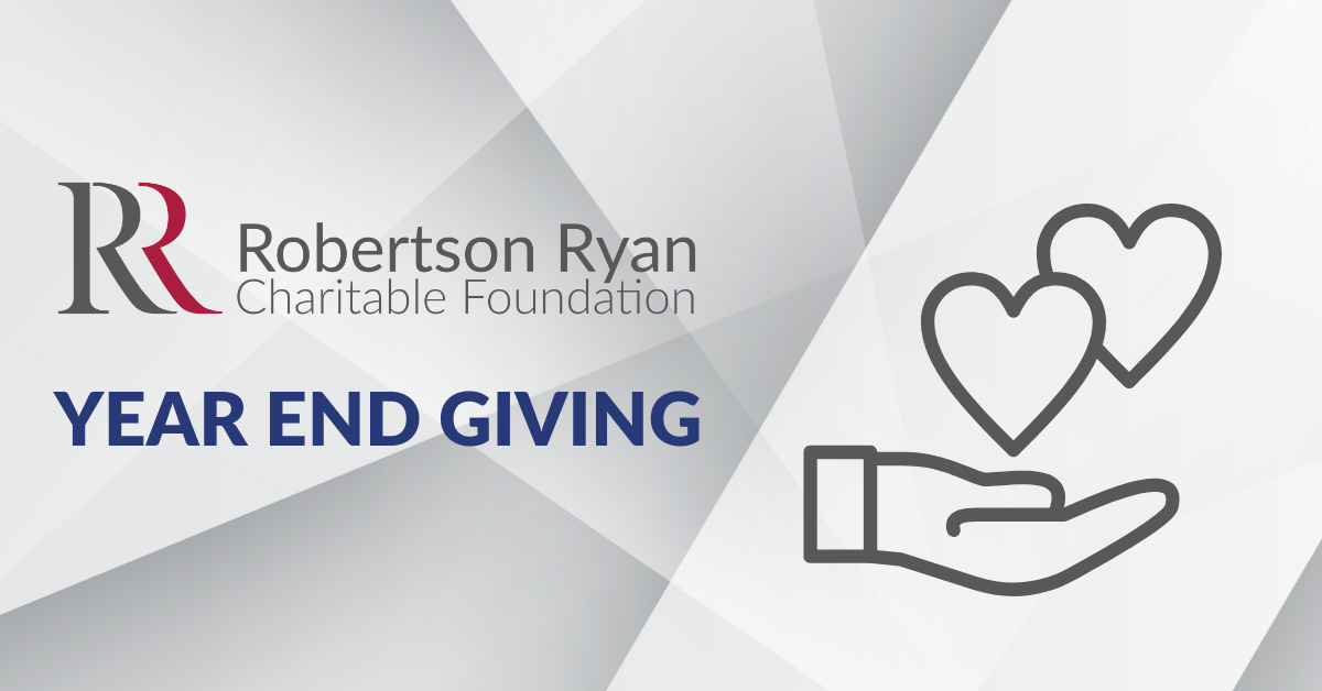 Foundation Logo with Year End Giving Text and Open Hand with Heart