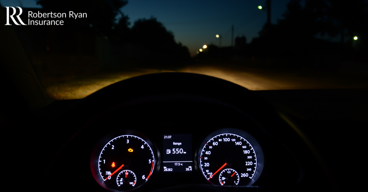 Dashboard looking out to night time road